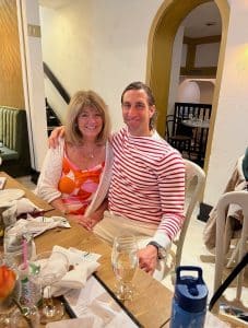 Mike posing with his Mom at her birthday party